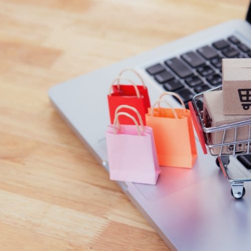 Shopping,Online.,Cardboard,Box,With,A,Shopping,Cart,Logo,In Shopping,Online.,Cardboard,Box,With,A,Shopping,Cart,Logo,In